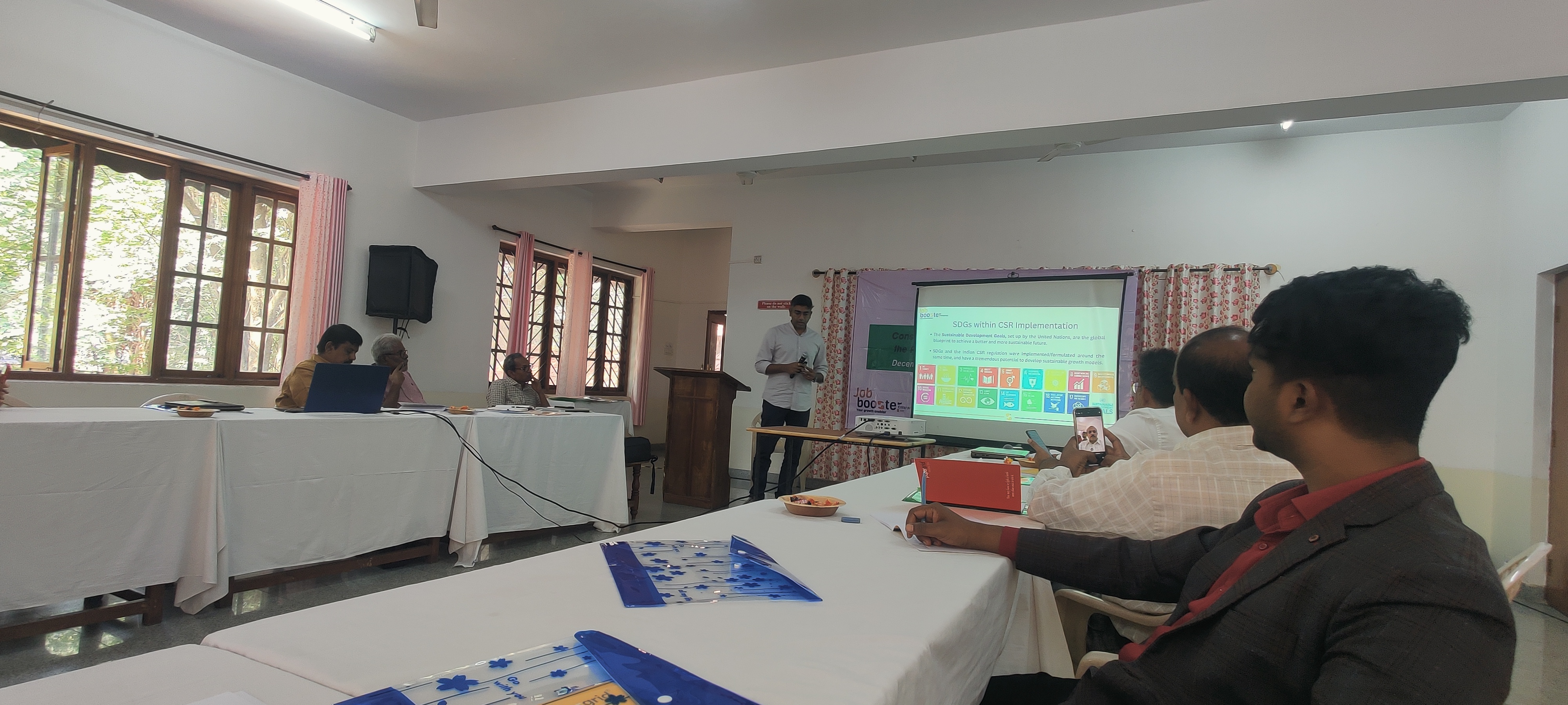 Representatives participate in a JBI-led discussion on CSR implementation, community development, and sustainable impact.